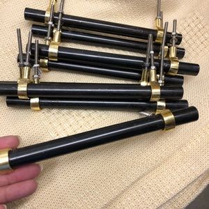 Black Metal and Brass Drawer Pulls